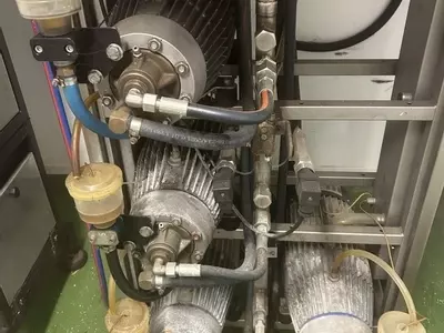 Close-up of Delta Booster pump assembly before servicing in Brownhills, with all pump units ready to be serviced